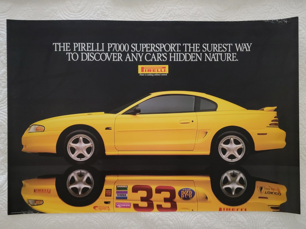 Pirelli Poster Ford Mustang Reflection Dealer Poster
The Pirelli P7000 Supersport.  The surest way to discover any cars hidden nature
Power is Nothin without control
Ford Mustang Nascar
Pirelli logo
36x24
36" x 24"