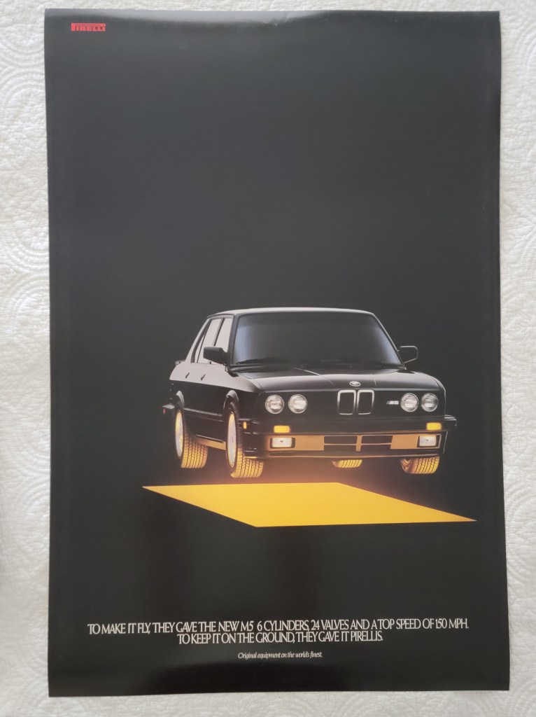 Pirelli Poster BMW M5 Levitation Levitating Flying
To Make It Fly, They Gave the New M5 6 Cylinders 24 Valves and a Top Speed of 150 MP.  TO Keep It on the Ground They Gave it Pirellis
Original Equipment on the world's finest
24x36
24" x 36"
Pirelli logo