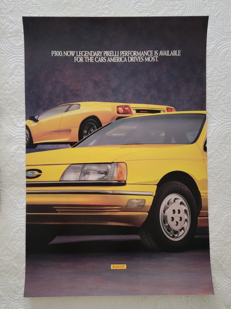 Pirelli Poster Lamborghini Diablo Ford Taurus 
Yellow
P300. Now Legendary Pirelli Performance is Available For the Cars America Drives Most 
Pirelli logo
25x36
24" x 36"