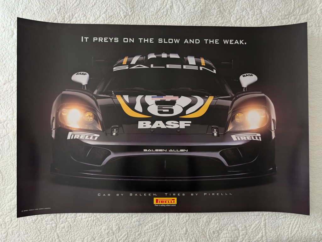 A promotional poster featuring a Saleen race car, displaying the text 'It preys on the slow and the weak.' The car is black with yellow and white stripes and logos for BASF and Pirelli.

pirelli poster saleen race car
