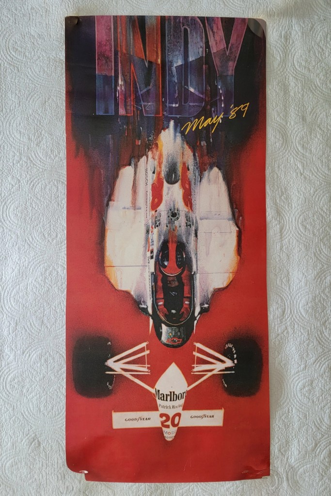 Vintage poster of an Indy car with the text 'INDY May 89' in bold colors.
Indy May 1989
Copyright Philip Morris
Indy car Poster
